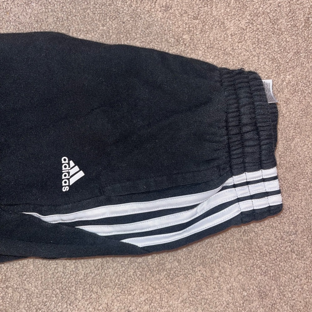 Adidas Black and White Sweatpants with Classic Stripes